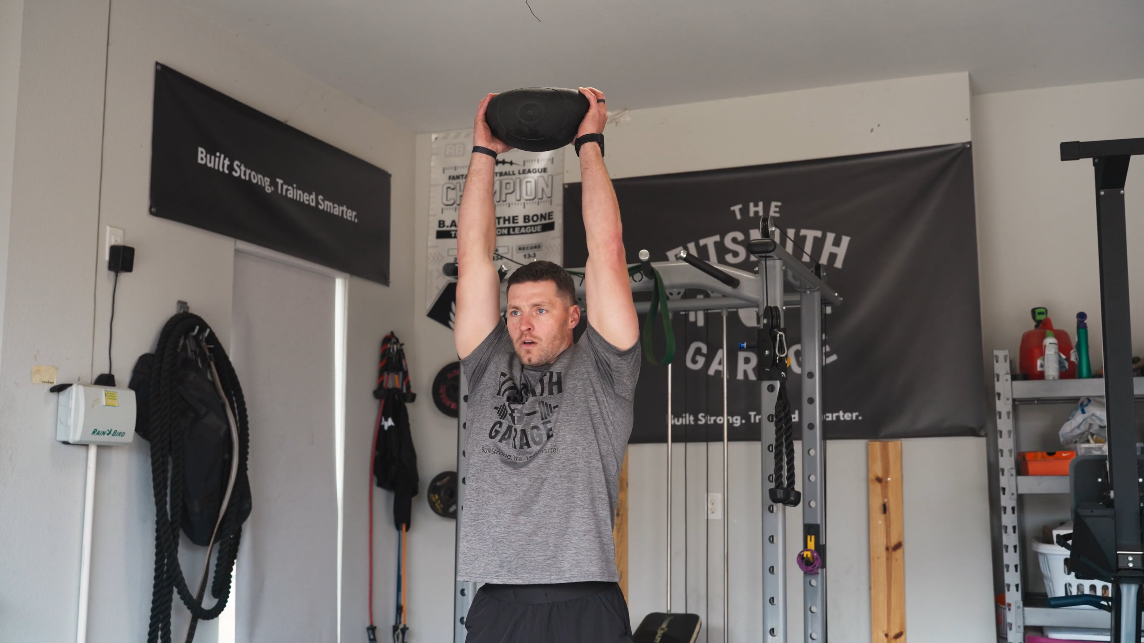 Overhead strength training at FitSmith Garage